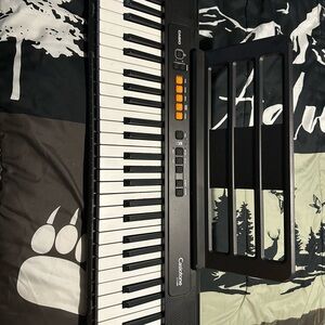 Casio Black Keyboard with Orange Accents